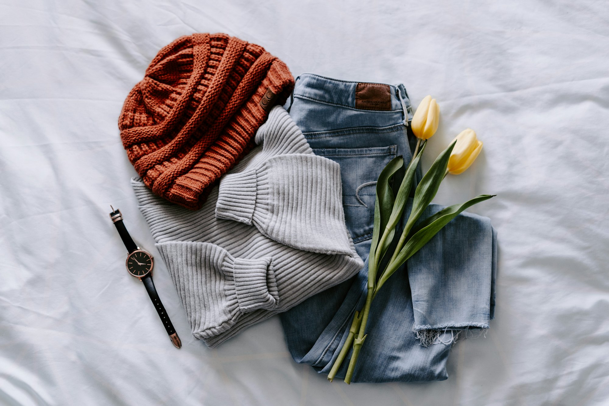 Folded premium fabrics in warm natural tones